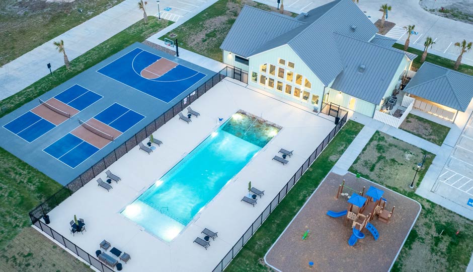 Copano Bay center with pool, courts and playground